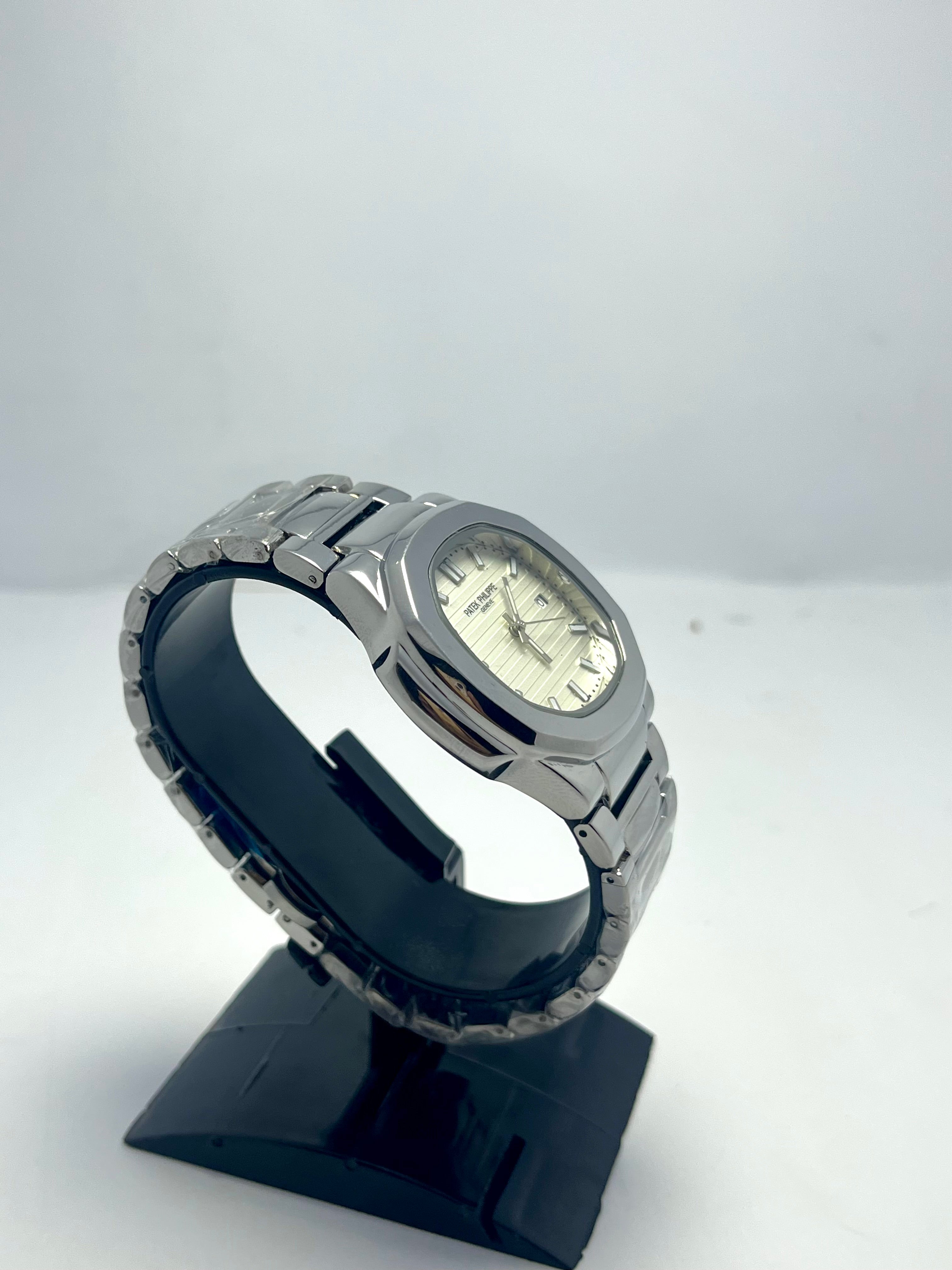 PATEK PHILIPPE GENEVE WATCH WITH WHITE DIAL WITH DATE